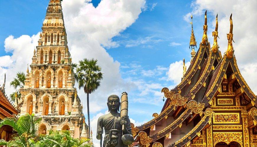 standing statue and temples landmark during daytime