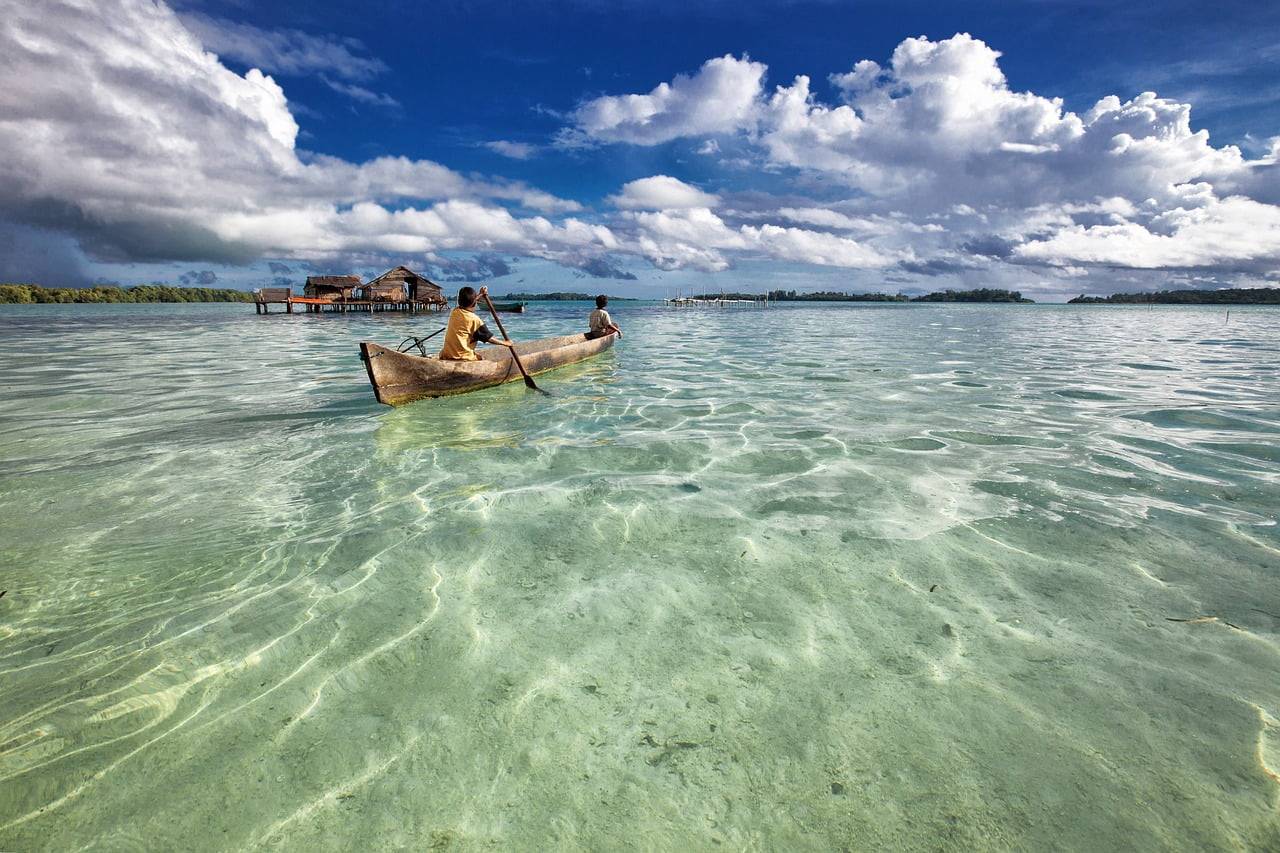 lagoon, dugout canoe, paddling