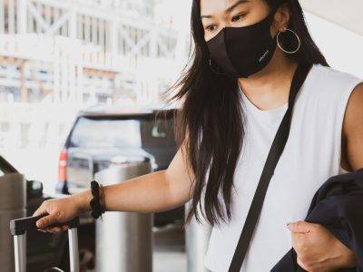 woman in black and white tank top wearing black sunglasses