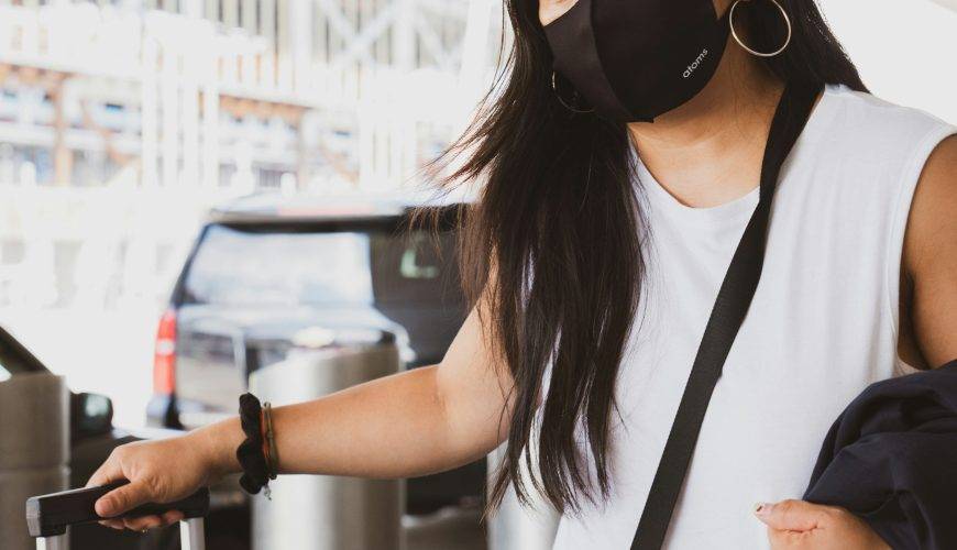 woman in black and white tank top wearing black sunglasses